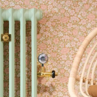 Windsor One-Pipe Steam TRV in an Unlacquered Brass finish with our Mercury 2 Column cast iron radiator in Little Greene Peagreen