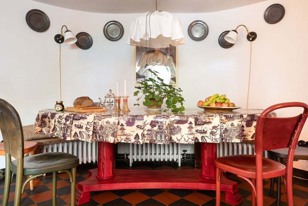 Beata Heuman Studios 188 Hammersmith Road with Castrads cast iron radiators under the kitchen bench seating